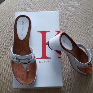 Anne Klein white 2" slide sandals.